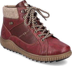 Red ankle boot with tan treaded sole, lace-up closure, and felt-like collar.