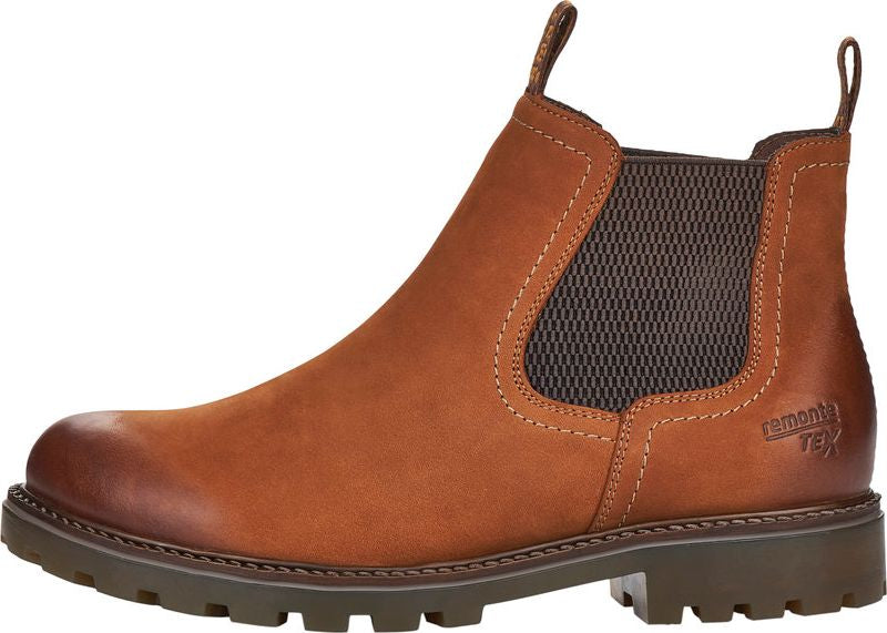 Side view of brown ankle boot with elastic side panels and lug sole.