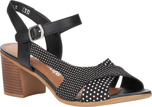 Black sandal with polka dots, ankle strap and block heel.