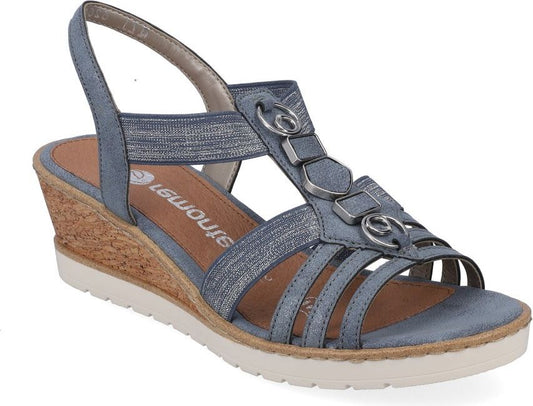 Blue sandal with wedge heel, multiple straps, and decorative metal accents.
