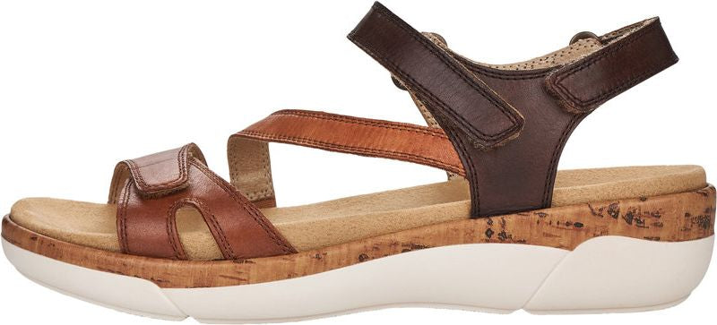 Leather sandal with a cork platform sole.