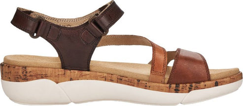 A sandal with brown straps and a cork footbed with a white sole.