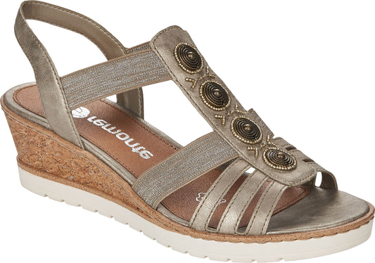Wedge heel sandal with a tan cork heel and white sole; the golden upper has elastic straps and decorative bead accents.