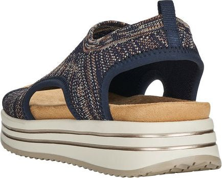 Platform sandal with multi-tone knit upper, open toe, elastic opening, and beige insole.