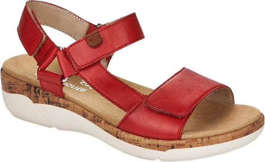 Red leather sandals with velcro straps and cork wedge.