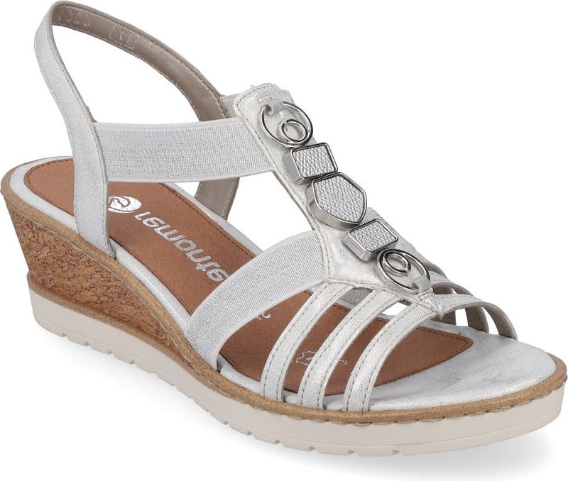 Silver sandal with elastic straps, wedge heel, and decorative metal embellishments.