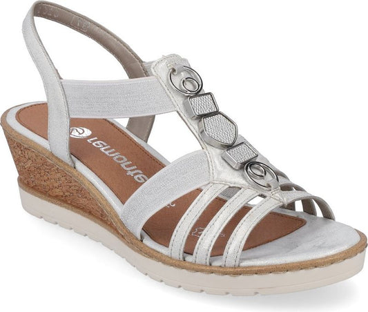 Silver sandal with elastic straps, wedge heel, and decorative metal embellishments.