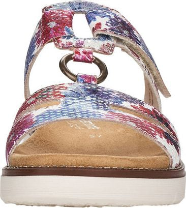 Open-toed sandal with patterned straps connected by a metal ring on a platform sole.