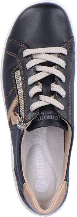Close-up of a blue leather sneaker with white laces and a side zipper.
