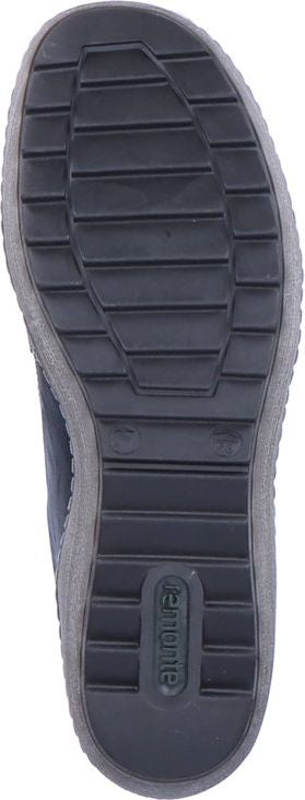 Shoe sole with textured rubber.