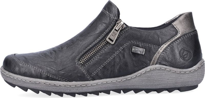 A charcoal-gray low-rise shoe features a decorative side zipper and sawtooth sole.