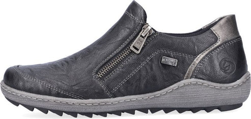 A charcoal-gray low-rise shoe features a decorative side zipper and sawtooth sole.