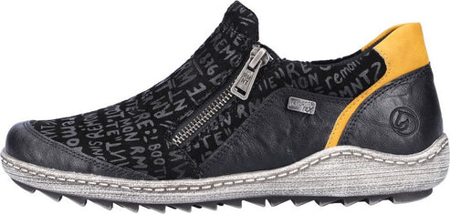 A black low profile slip-on shoe with a zipper and yellow accent.