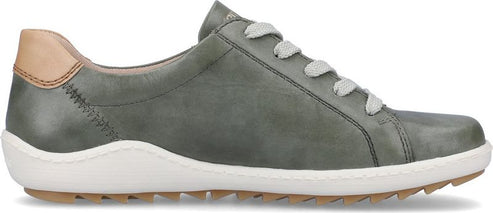 A green leather sneaker with white laces and a white sole.