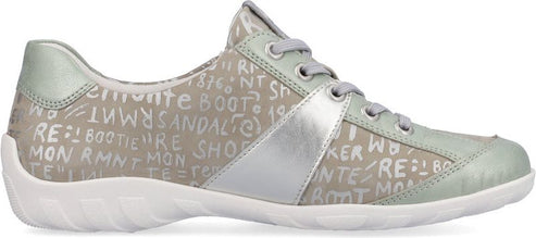 A gray shoe with a white sole and silver accents has letter prints on its body.