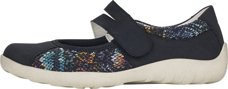 A Mary Jane style shoe with a patterned design and a velcro strap.