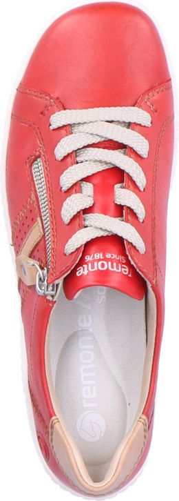 A red sneaker with white laces and a zipper.