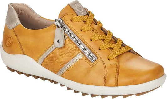 Tangerine colored casual shoe with side zipper and white sole.
