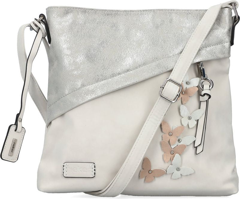 White crossbody bag with silver top flap, adjustable shoulder strap, and butterfly accents.
