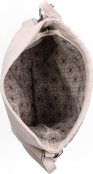 An open light-colored handbag with a patterned lining.
