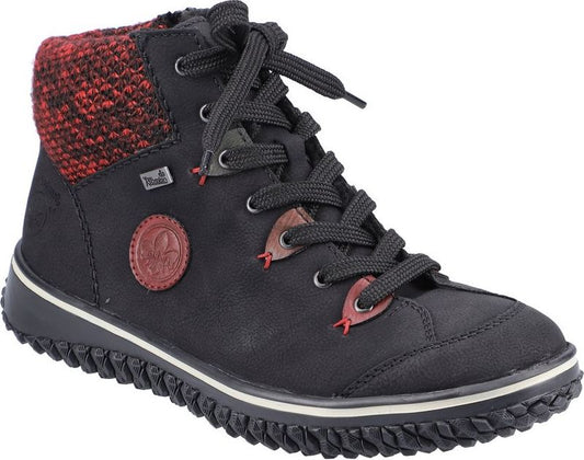 Black ankle boot with red knit collar and red accents.