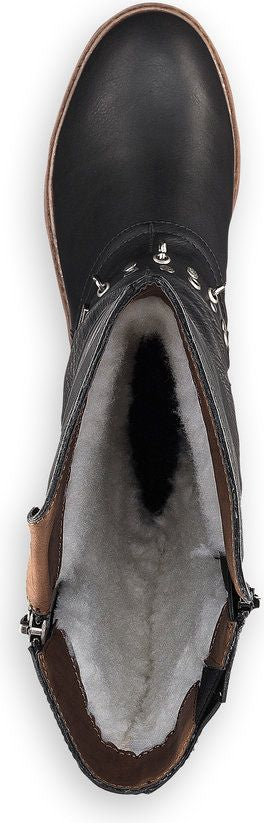A top down view of an ankle high black leather boot with light colored inner lining.