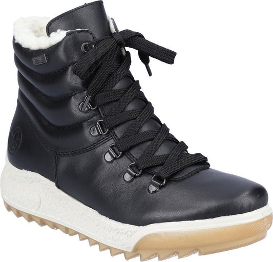 Black high-top shoe with laces, white fuzzy lining, and thick white sole.