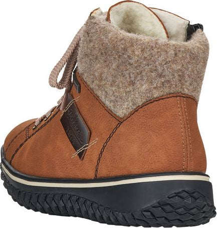 Tan ankle boot with laces, brown felt-like cuff, side zipper, and treaded black sole.