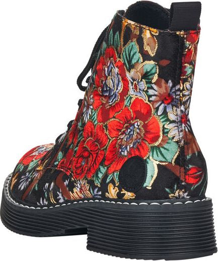 Floral embroidered combat boot with black sole, laces, and pull tab.