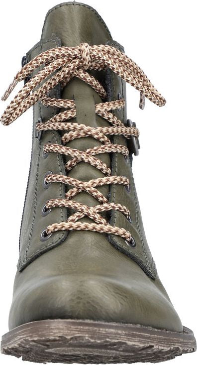 Front-facing view of an olive-green leather ankle boot with patterned laces, metallic eyelets, and a side zipper.