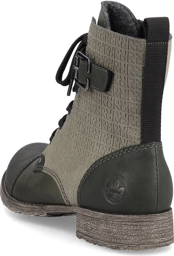 Olive green combat boot with laces and a decorative buckle featuring an allover textured surface and a small block heel.