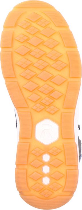 A shoe sole with a grid pattern and circular indentations.