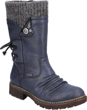 Blue mid-calf boot with knit collar, lace-up accent, button detail, and a lug sole.