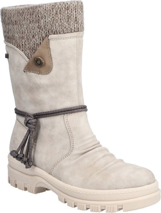 Cream-colored boot with a gray knit sock-like top, decorative button, and a rope-like tie around the ankle.