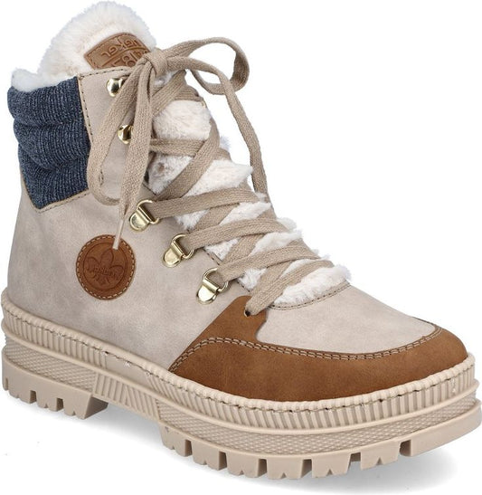 Lace-up light beige ankle boot with brown accent, faux fur lining, lug sole and knit collar.