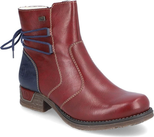 Red ankle boot with blue trim and lace up back.