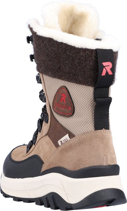 Tall tan boot with brown trim and black sole and laces, with a white faux fur lining peeking out at the top.