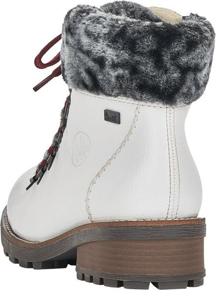 Back view of a white leather boot with fur trim, lace-up closure, and lug sole.
