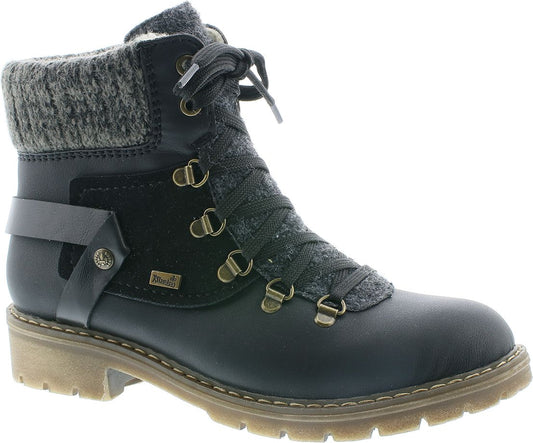 Black ankle boot with knit collar, lace-up closure, side strap, and lug sole.