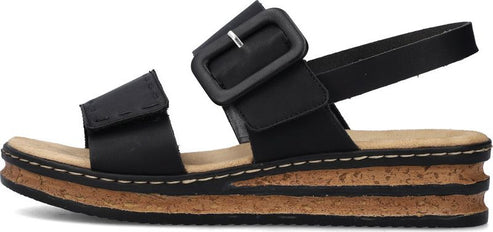 Black platform sandal with cork sole and buckle.