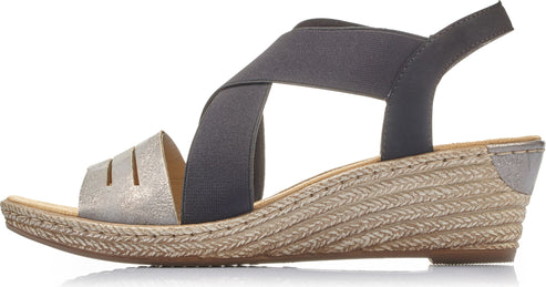 Womens wedge sandal with light gold toe, woven rope design wedge heel, and crossed elastic straps.