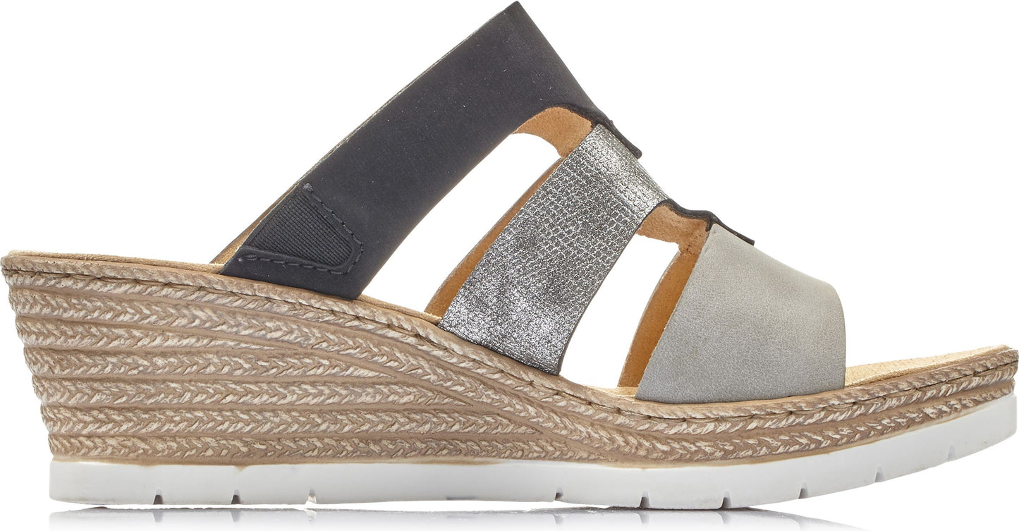 Wedge sandal with gray, silver, and black straps, on braided straw-covered wedge.