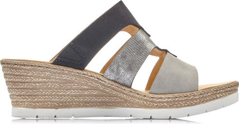 Wedge sandal with gray, silver, and black straps, on braided straw-covered wedge.