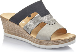 Wedge sandal with black, silver and gray straps and a woven texture on the wedge.