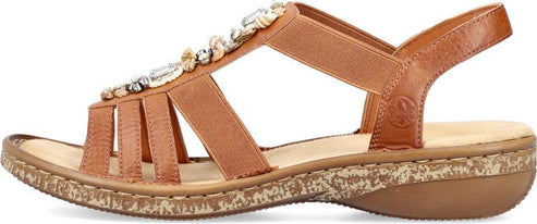 A brown sandal with straps and decorative embellishments.