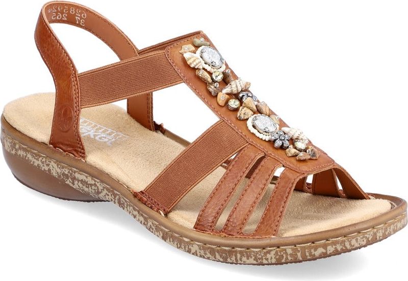 Brown sandal with elastic straps, gemstone embellishments, and low wedge heel.
