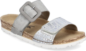 Silver slide sandal with two adjustable straps, a decorative buckle, a cork footbed and a white sole.