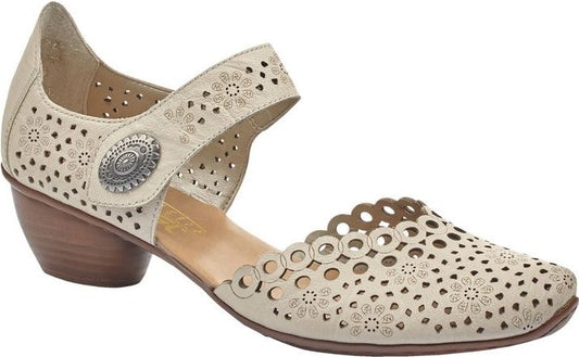 Beige dress shoe with decorative cutouts and a small heel.