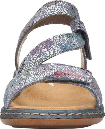 Open-toe sandal with floral cracked leather and velcro straps.