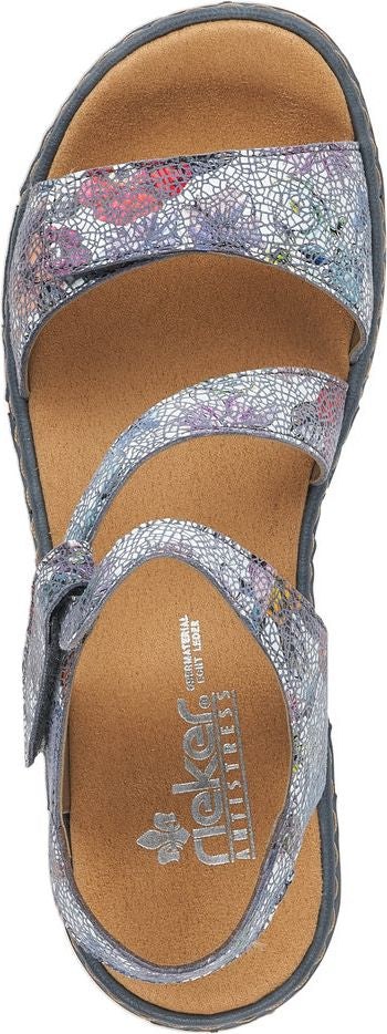 Floral pattern sandal with three straps and hook and loop fastener.